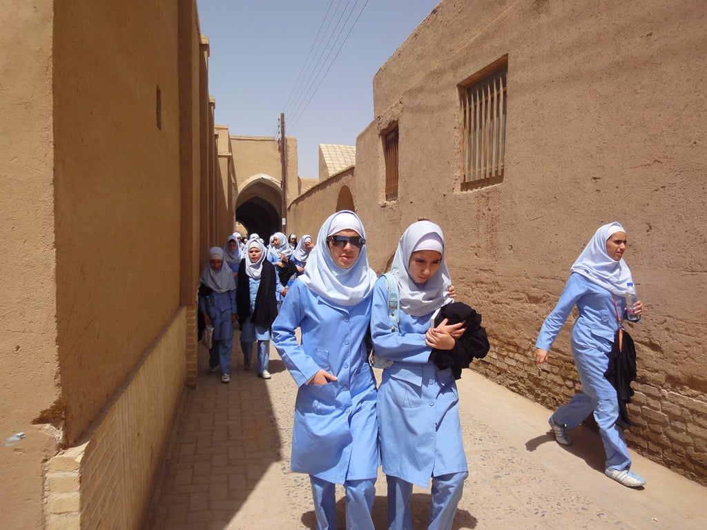 Students explore the time-honored streets of Yazd's old city.