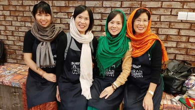 Tourists From Indonesia And South Africa Exploring The Flavors Of Iranian Cuisine