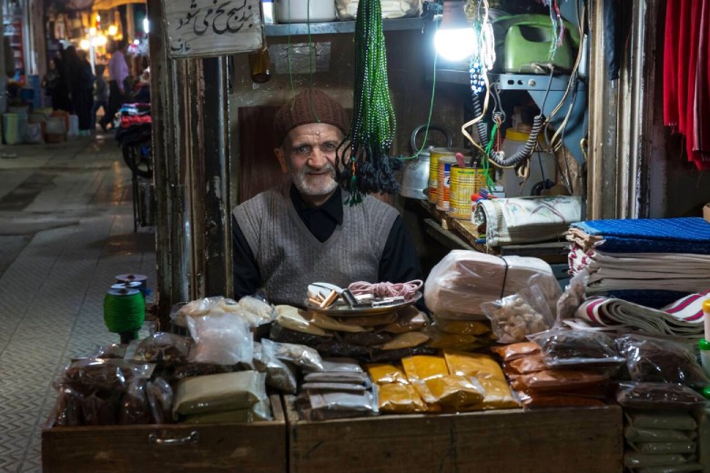 Friendly Old Shopkeeper Doing Small Trade in His Shop, Zanjan bazaar