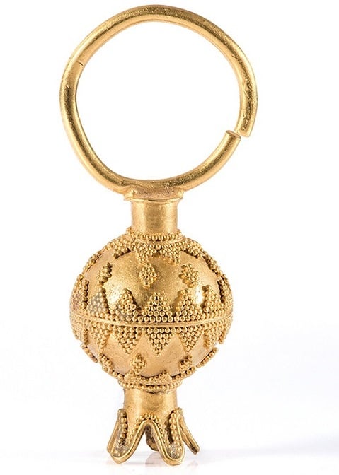The Pomegranate In Iran: A Symbol Of Life, Faith, And Art 3 Golden Pendant In The Shape Of A Pomegranate, Kurdistan, Achaemenid Period, National Museum Of Iran. A Golden Pendant In The Shape Of A Pomegranate, Made Of Gold With A Weight Of 12 Grams. This Earring Is Crafted With Gold Wires In An Artistic Manner. During The Achaemenid Period, Both Men And Women Wore Earrings.
