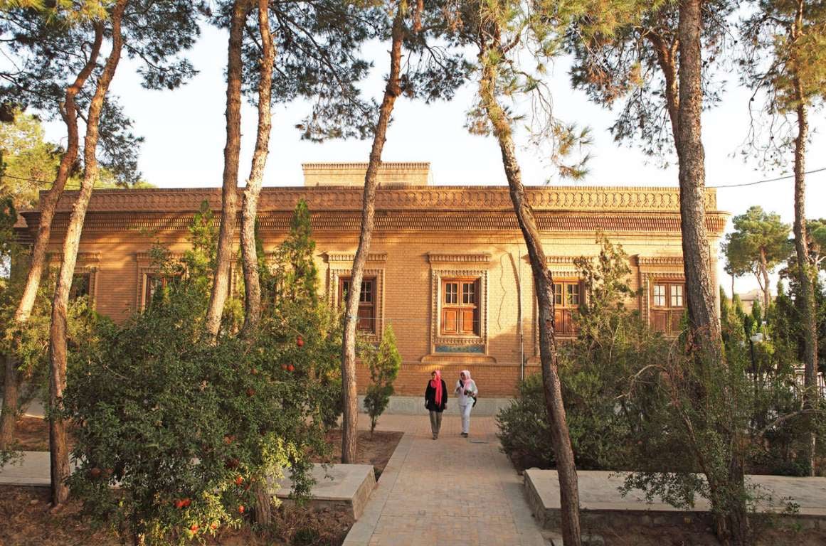 The Pomegranate In Iran: A Symbol Of Life, Faith, And Art 11 Yazd, Iran – May 5, 2015: The Serene Pomegranate Garden Of The Ateshkadeh Zoroastrian Fire Temple, Nestled In The Historic Heart Of Yazd.