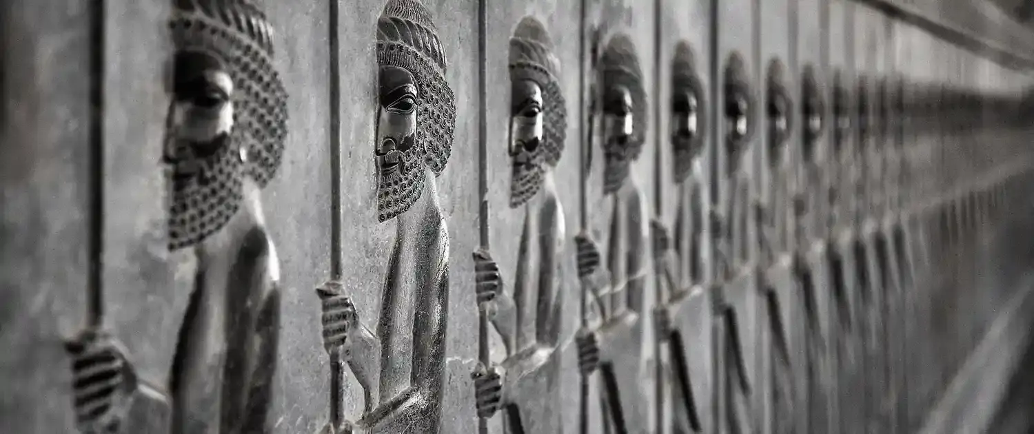 Travellers exploring Iran's historic Persian architecture on a SURFIRAN tour