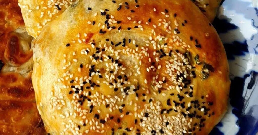 18 Popular Types Of Iranian Bread You Must Try 16 Nutritious Kakoli Bread From Chaharmahal And Bakhtiari, Made With Wheat Flour, Cumin, Almonds, Walnuts, And Raisins, Brushed With Egg Yolk And Saffron.