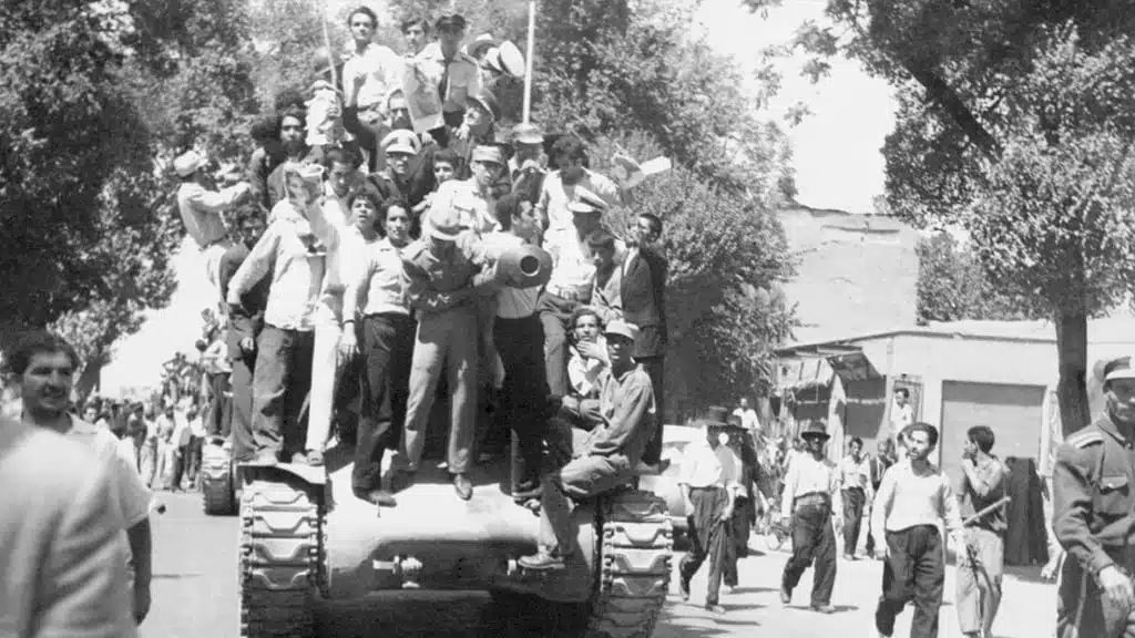 Iranian Army officers and supporters of the monarchy gather on August 27, shortly after the shah returned from a brief period of exile to reclaim power.