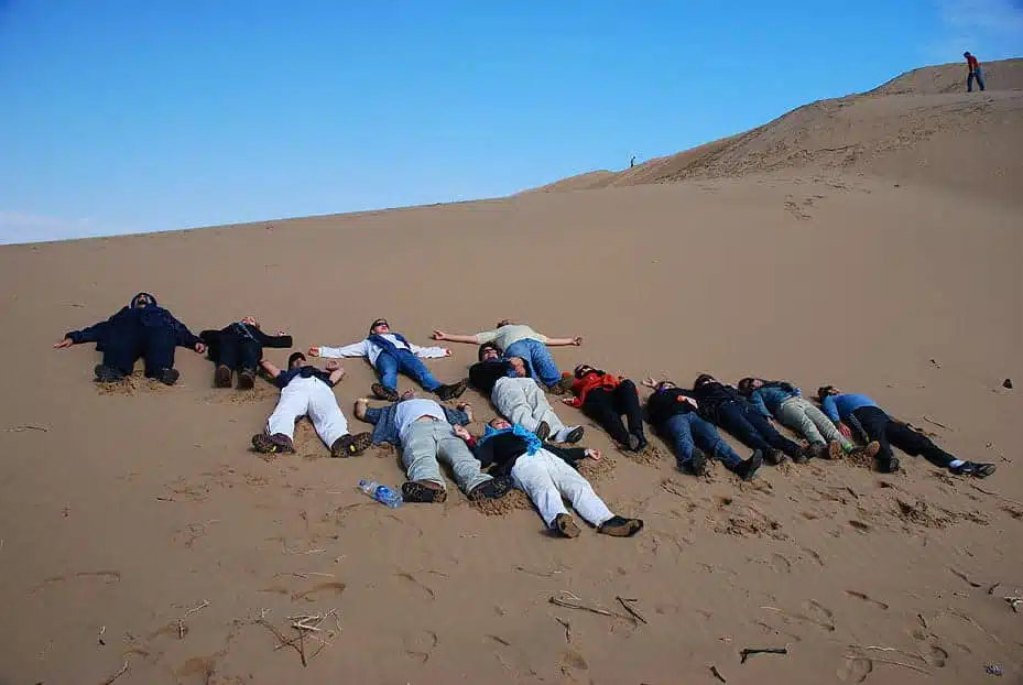 Group of tourists in the Maranjab desert, Kashan, Iran Photo by SURFIRAN