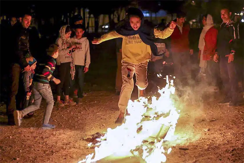 Jumping over the fire during the Chaharshanbe Suri festival in Iran
