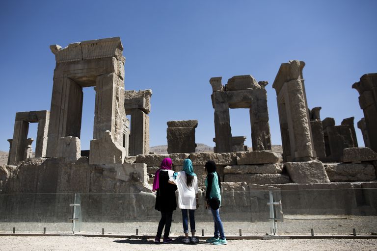 Tourists Admire The Palace Of King Darius Of Achaemenid In Persepolis
