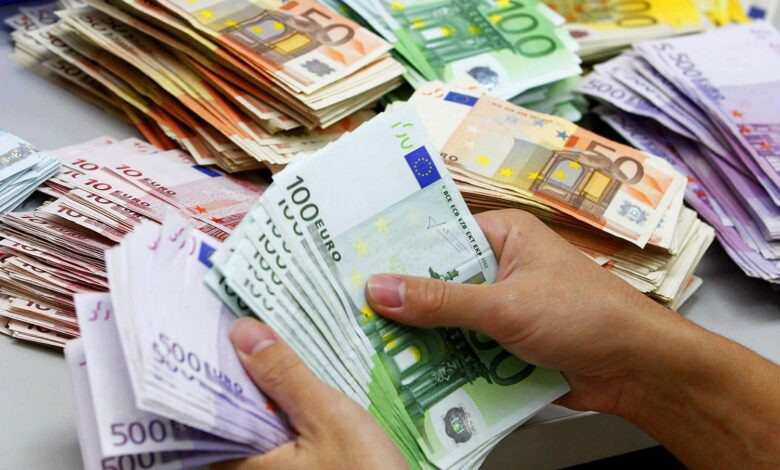 Iranian Rial Banknotes And Currency Notes In A Hand