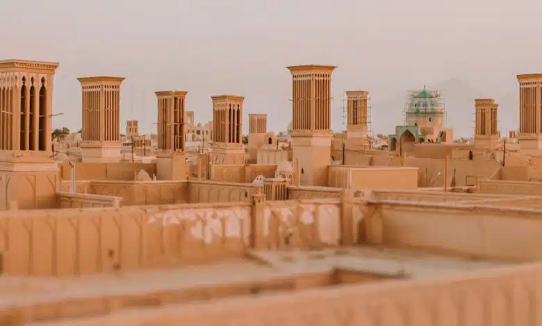 Yazd Old City: A Labyrinth of History. Winding lanes, sun-baked mud-brick buildings, and iconic wind catchers define this ancient desert city.