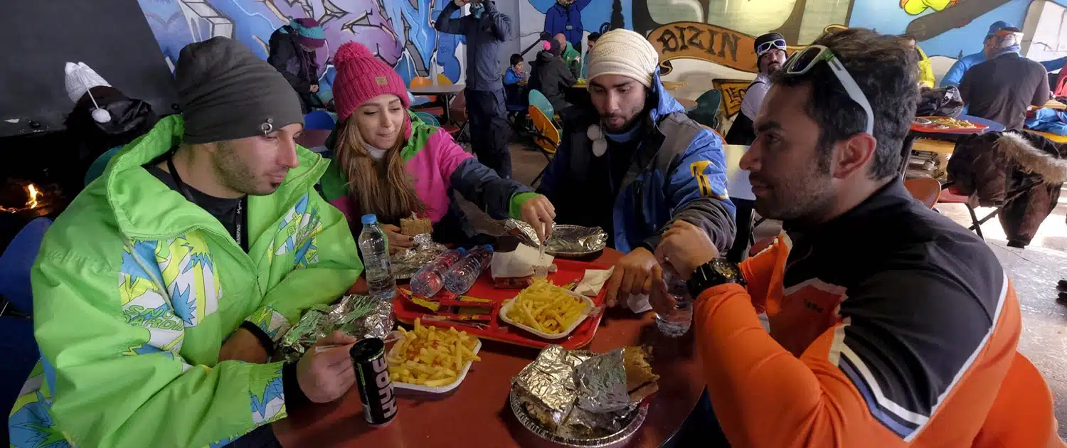 Young people skiing at the Dizin ski resort