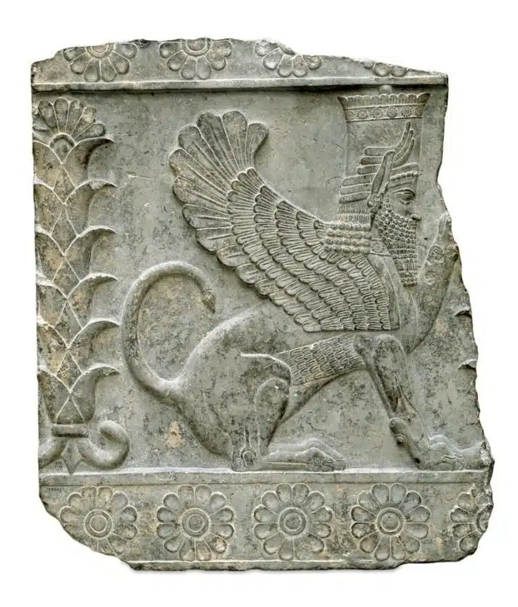 Limestone relief fragment showing a seated male sphinx. Persepolis (modern-day Iran), Achaemenid period, probably 4th century BC.