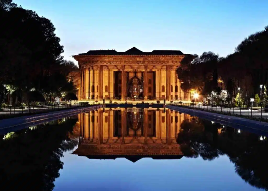 The Reflection of Wooden Columns of the Chehel Sotoon Palace in the Pool The Reflection of Wooden Columns of the Chehel Sotoon Palace in the Pool