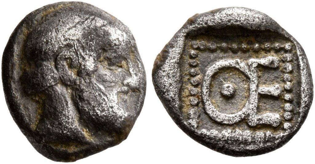 The Achaemenid Empire: Foundations Of Imperial Governance 12 Coin Of Themistocles As Governor Of Magnesia, C. 465–459 B.c. This Coin, Issued During Themistocles' Tenure As Governor Of Magnesia Under Persian Rule, Features The Head Of Zeus On The Obverse And The Initials Θε (Themistocles) On The Reverse. It Symbolizes The Blending Of Greek And Persian Influences During The Early Achaemenid Period.