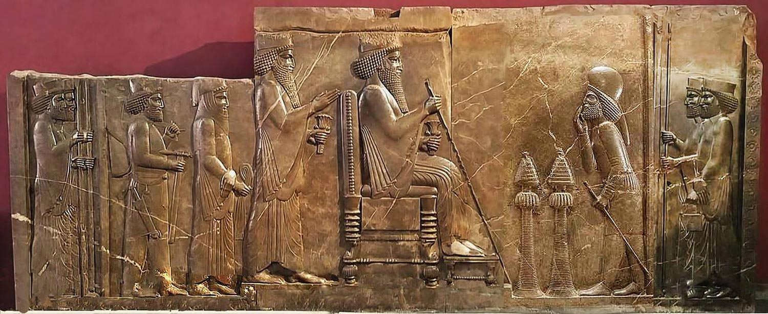 The Achaemenid Empire: Foundations Of Imperial Governance 7 Limestone Relief Of King Darius I, Ca. 5Th Century B.c. This Intricate Limestone Relief From Persepolis Depicts King Darius I Seated On A Throne, With Crown Prince Xerxes Standing Behind Him. Guards And Attendants Complete The Scene, Symbolizing The Grandeur And Hierarchy Of The Achaemenid Court. Persepolis Served As A Ceremonial Capital, Showcasing The Empire'S Artistic And Administrative Sophistication. National Museum Of Iran.