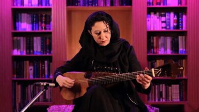 Iranian Musician Performs A Rubab Solo In The Traditional Avaz Abu Ata, Capturing The Timeless Essence Of Persian Classical Music.