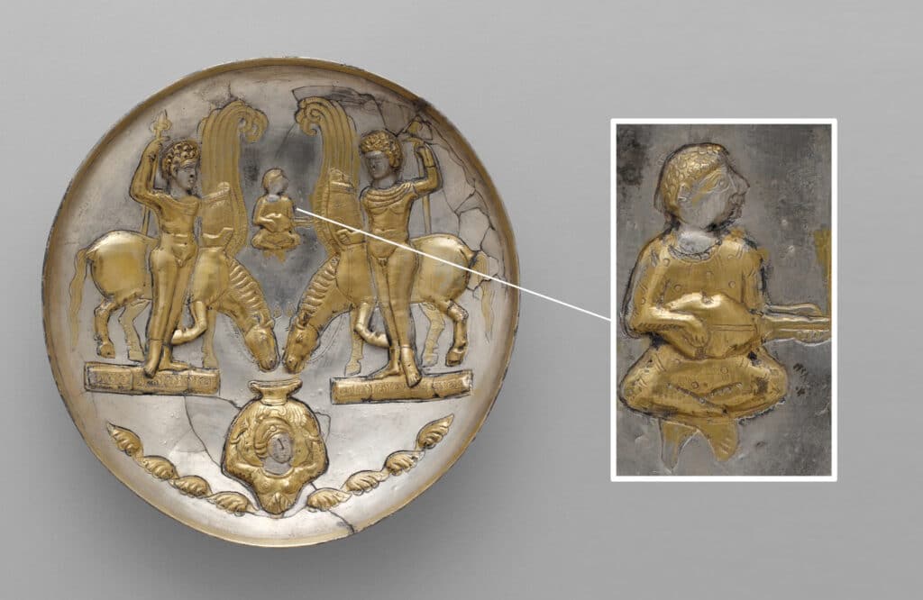 The Art Of Crafting And Playing Rubab Recognized As Unesco Heritage 3 Lute Or Rabob, 5Th-6Th Century A.d. This Gilded Silver Sasanian Plate Depicts Two Youths With Winged Horses, Drawing Inspiration From Graeco-Roman And Iranian Themes. A Female Figure, Possibly Anahita, Holds A Vessel From Which The Horses Drink. In The Background, A Cross-Legged Figure Plays The Lute. The Scene May Symbolize Cosmic Themes, Potentially Linked To The Gemini Constellation.