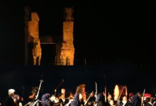 Armenian Philharmonic Orchestra Performing Under The Ancient Columns Of Persepolis.