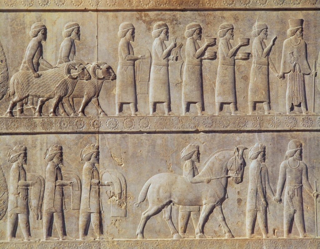 Armenian Delegates Carved In Stone On The Apadana Relief At Persepolis, Shown Bearing Gifts During A Ceremonial Procession At The Achaemenid Court. Dating To Around 500 Bce, The Relief From The East Stairway Of The Apadana Reflects The Presence Of Armenian Subjects Within The Imperial Order Of Ancient Iran And Their Participation In Courtly Rituals Associated With The Nowruz Season.