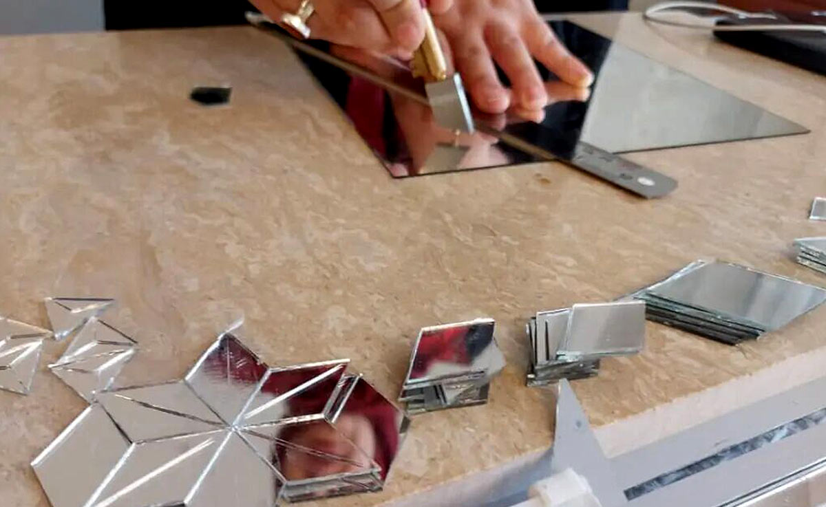 Artisan Shaping Mirror Fragments For Traditional Ayeneh-Kari Decoration In Iran
